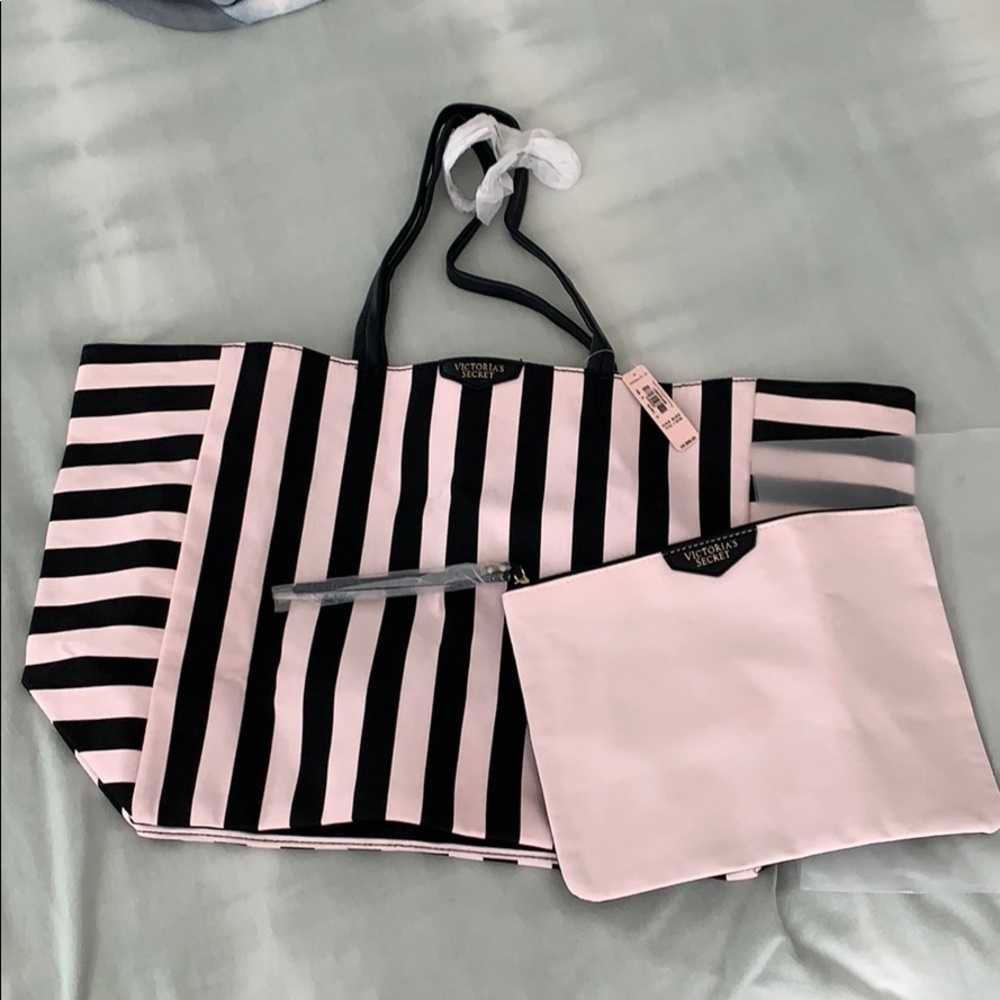 Victoria Secret tote and zippered clutch.
